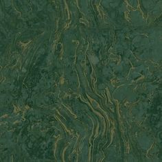 a green marble textured wallpaper with gold and black swirls on the surface