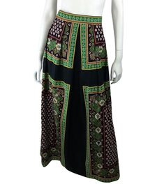 VINTAGE 1970s BOHEMIAN BLACK GREEN RED COTTON MAXI SKIRT WITH ORIGINAL METAL ZIP FASTENING . 🖤🖤 Vintage  🖤🖤 Measurements UK size : 10/12 (Shown on size 8 Mannequin) clipped to fit. Please check your measurements for best fit. All our measurements are taken whilst the garment is lying flat. We then double these measurements to reflect the actual size. Waist.. 30" Length..  42" (Waist to bottom hem) UK sizes. Conversion to US and European sizes UK 10=US 6/ EU 38/ AU 10   Condition:  Excellent Retro Green Long Skirt, Retro Green Long Skirt Bottoms, Retro Black Long Skirt, Vintage Black Long Skirt, Vintage Black Mini Skirt, Red Maxi Skirt, Boho Rock, Cotton Maxi Skirts, Red Maxi