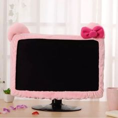 a computer screen with a pink bow on it and the words 20 - 27 inch screen