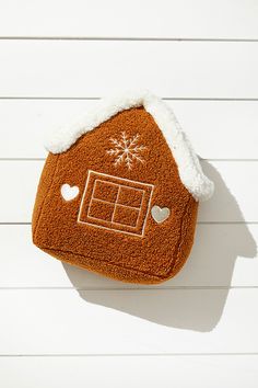 a towel shaped like a house with a snowflake on it