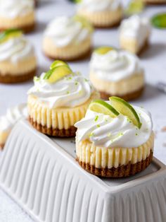 mini key lime cheesecakes on a tray