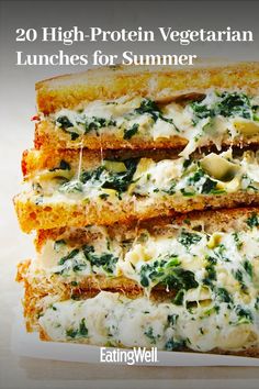 two sandwiches stacked on top of each other with cheese and spinach toppings in them