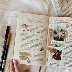 an open book with pictures and writing on it next to a pen, eyeglasses, and other items