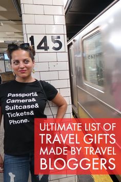 a woman standing next to a subway train