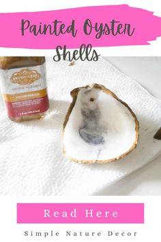 an oyster shell with the words painted oyster shells read here to make this simple nature decor