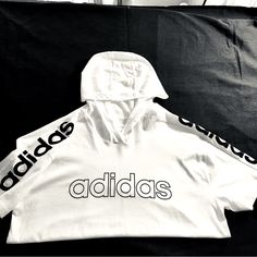 Adidas Hoodie Shirt Short Sleeves 100% Cotton. Chest 20 Across. Length 27” From Top Of Shoulders To Hemline. New With Tags White Hip Hop Hoodie Top, White Hooded Top With Graphic Print, White Graphic Print Hooded Top, Adidas Logo Cotton Crew Neck Hoodie, Adidas Cotton Crew Neck Hoodie, White Short Sleeve Hoodie For Streetwear, White Winter Sweatshirt With Three Stripes Branding, Winter White Sweatshirt With Three Stripes Branding, White Hooded Cotton Top