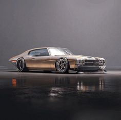 an old car is parked on the floor in front of a dark background with light reflections