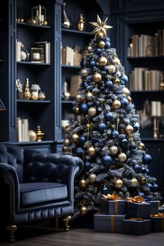 a christmas tree with gold and blue ornaments in a room filled with bookshelves