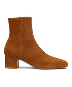 Introducing our first-ever boot, a chic evolution of our best-selling smoking slipper. Crafted of premium tan stretch suede, this classic ankle bootie features a walkable 50mm heel for an elongating lift. Thanks to our signature Flex-Front technology and footbeds with 7 layers of cloud-like comfort, enjoy a glove-like fit and endless comfort. The interior zipper and grosgrain back tab add a touch of convenience and refinement. Whether dressing up or keeping it casual, the Starling 50 Bootie is y 7 Layers, Mary Jane Flats, Comfortable Flats, Lacing Sneakers, Starling, Flats For Sale, Ankle Bootie, Flats Top, Sneaker Shopping