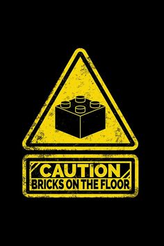 a woman holding up a poster with the words caution bricks on the floor in front of her