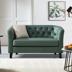 a living room scene with focus on the couch and coffee table in the foreground