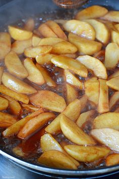 the food is being cooked in the pan on the stove top and ready to be eaten