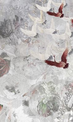 several birds are flying in the sky above flowers and leaves on a wallpapered surface