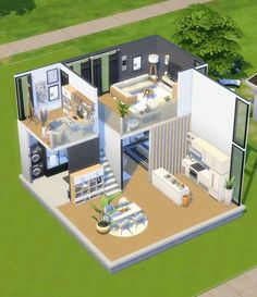 an aerial view of a modern house with living room, dining and kitchen areas in the center