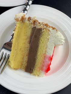 a piece of cake on a plate with a fork