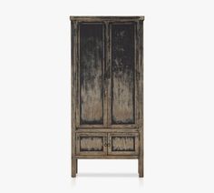 an old wooden cabinet with two doors