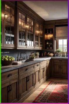 a kitchen filled with lots of wooden cabinets and counter top space next to a window