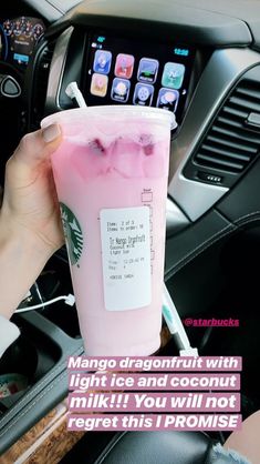 someone holding up a pink drink in their hand with the caption, mango dragonfruit with light ice and coconut milk