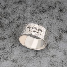 925 Silver Hammered Cutout Hebrew Name Ring - the band of the ring is carefully crafted to ensure a comfortable fit, with smooth edges and a polished interior surface. The width of the band is designed to strike the perfect balance between elegance and visibility, allowing the cutout Hebrew name to stand out while maintaining overall wearability. * Material: High Quality 925 Sterling Silver  * Handmade item * 0.7mm Thickness SIZES * Ring length: 7.5mm * Ring size: The ring is open and the size c Vintage Spoon Rings, Pewter Ring, Antler Ring, Love Knot Ring, Family Rings, Jewish Jewelry, Name Ring, Hammered Ring, Name Rings