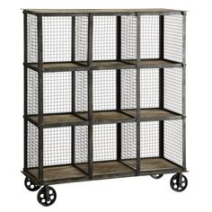 an industrial metal and wood shelf with four shelves on casteors, each holding wire mesh panels