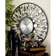 a clock that is on the wall next to some books and vases with plants