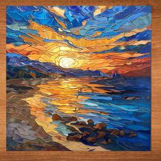 a piece of art that has been made to look like a sunset over the ocean