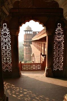 an archway leading to the top of a building