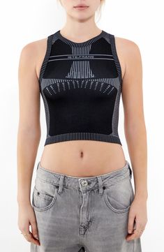 This cool cropped tank is crafted in a close-fitting silhouette with a tied-and-cutout back. 15" length (size Medium) Ties at back Crewneck Sleeveless 38% polyester, 35% recycled polyamide, 21% polyamide, 6% elastane Machine wash, line dry Made in Turkey High Stretch Crop Top Tank, Black Sleeveless Elastane Crop Top, Seamless Cropped Tops For Athleisure, Black Cropped Athleisure Tank Top, Elastane Fitted Crop Top, Black Tank Crop Top With Medium Support, Cropped Top With Seamless Construction, Black Cropped Crop Top Athleisure, Cropped High Stretch Tank Top With Built-in Bra