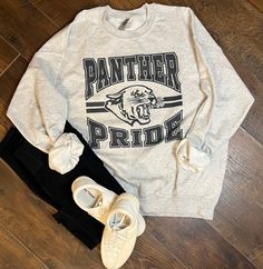 Panther Pride ash crew -Wash shirt inside out, no fabric softener and tumble dry. **There are no returns!! -Once the shirt is out of my hands and with the USPS you will need to contact USPS regarding your order. If the item is lost, you will need to contact USPS and file a claim with them. There are times where a certain shirt color is sold out and i am unable to get it, if this happens, I will message you. We can either choose a different shirt color, wait until it gets back in stock or i can r School Football Shirts Design, Booster Club Merchandise, Panther Pride Shirt School Spirit, Middle School Spirit Wear, High School Staff Shirts, School Spirit Apparel, Cute School Shirt Designs, Mascot Tshirt Designs, School Shirt Designs Spirit Wear Trendy