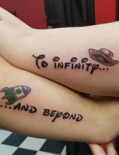 two people with tattoos on their legs that say to infinitip and beyond