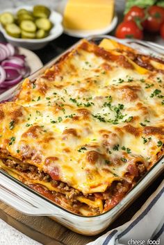 a casserole dish with meat, cheese and vegetables