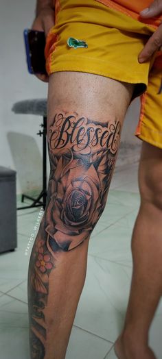 a man with a tattoo on his leg