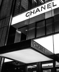 black and white photograph of chanel store front