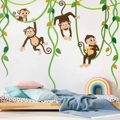 three monkeys hanging on the vine wall decals in a child's bedroom area