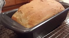 a loaf of bread sitting on top of a pan