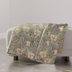 a couch with a blanket on top of it