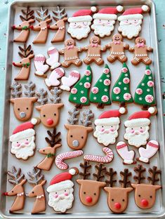 christmas cookies decorated like santa claus and reindeers