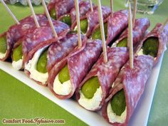 appetizers with pickles and cheese on a plate