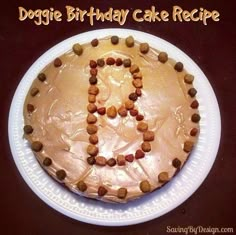 a peace sign cake on a plate with the words doggie birthday cake recipe written in it