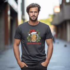 ✨ Santa's Brew Crew Christmas Beer Mug T-Shirt✨ 🛍️This festive t-shirt features a beer mug with a Santa hat, surrounded by holly and hops. Perfect for beer lovers celebrating the holiday season, it's a humorous take on the Christmas spirit. Ideal for holiday parties, pub crawls, or gift-giving. 💡 Printed by Monster Digital on Gildan 64000 tees 🌈 Please note: Colors may vary slightly from computer-generated mockups 🕒 Production time: 1-3 business days 🚚 Delivery time (US): 4-8 business days Christmas Beer Shirts, Holiday Bar, Beer Graphic, Christmas Drink, Christmas Beer, Pub Crawl, Christmas Drinks, Two Daughters, Beer Lovers