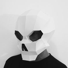 a man with a paper mask on his face