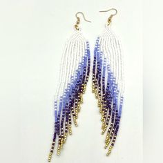 Amazing Handmade Long Beaded Statement Earrings With White, Purple, Periwinkle And Gold Seed Beads In A Gorgeous Angel Wings Pattern. The Longest Strand Is 6 Inches Long. Finished With Hypoallergenic Gold Plated Ear Hooks. * Unique Spring Break Accessory * Get Lots Of Compliments At Your Next Party * Wow Your Partner On Date Night Brand Name Hand Crafted Handcrafted By Me So Each Piece Is Brand New And One Of A Kind. Your Item Is Beautifully Packaged With Care And Shipped The Same Or Next Busine Adjustable White Beaded Earrings, Angel Wings Pattern, Spring Break Accessories, Angel Wings Earrings, Wings Pattern, Purple Periwinkle, Wire Earrings Handmade, Beautiful Beaded Earring, Wings Earrings