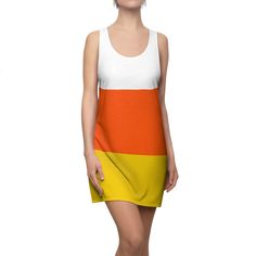 a woman wearing a dress with an orange, yellow and white color block on it