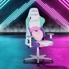 an office chair with a heart shaped pillow on it in front of colorful neon lights