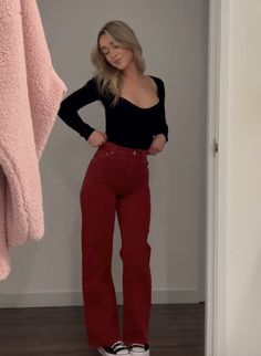 Red Flare Pants Outfit Winter, Red Curdory Pants Outfit, Red Jeans Outfits, Red Flared Pants Outfit, Maroon Flare Pants Outfit, Red Winter Outfits Aesthetic, Maroon Cargo Pants Outfit, Black Jeans Red Top Outfit, Red Courderoy Pants Outfit