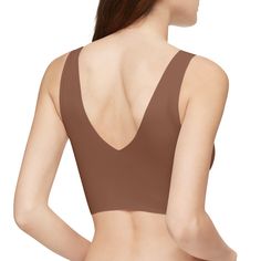 With a seamless finish and flexible fit, this invisibles lightly lined Calvin Klein bralette is crafted from smooth microfiber stretch. Designed with a v-neckline front and back, removable pads for added versatility, compact logo detailing and clean cut edges for invisible wear under clothing.Details: Lightly lined v-neck bralette Seamless elastic waistband Lightly lined bralette silhouette Smooth, flexible microfiber Clean cut edges, invisible under clothing V-neck, removable pads & logo at hem Calvin Klein Bralette, Clothing Details, Pajama Robe, Sleepwear Robe, Kids Socks, Clean Cut, Pajama Shorts, Pant Shirt, Short Tops