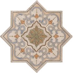 an intricately designed tile with blue and beige colors on the bottom, surrounded by ornate designs