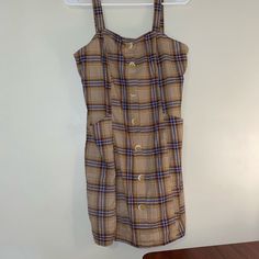 Plaid Dress From The Romwe Brand Has Pockets. Size Medium Best Fits 4-6 In Dress Sizes Never Worn Plaid Sleeveless Mini Dress For Day Out, Casual Mini-length Plaid Dress For The Beach, Plaid Summer Dress With Button Closure, Plaid Button Dresses For Day Out, Plaid Button Dress For Day Out, Casual Summer Plaid Dress With Button Closure, Fitted Sleeveless Plaid Casual Dress, Casual Fitted Sleeveless Plaid Dress, Casual Plaid Dress With Button Closure For Summer