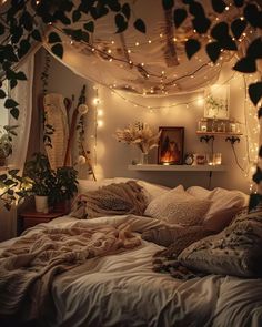 an unmade bed with lights strung from the ceiling and plants on the shelves above it