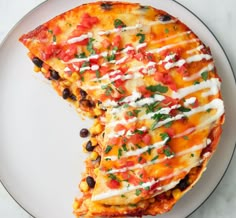 two slices of mexican pizza on a plate